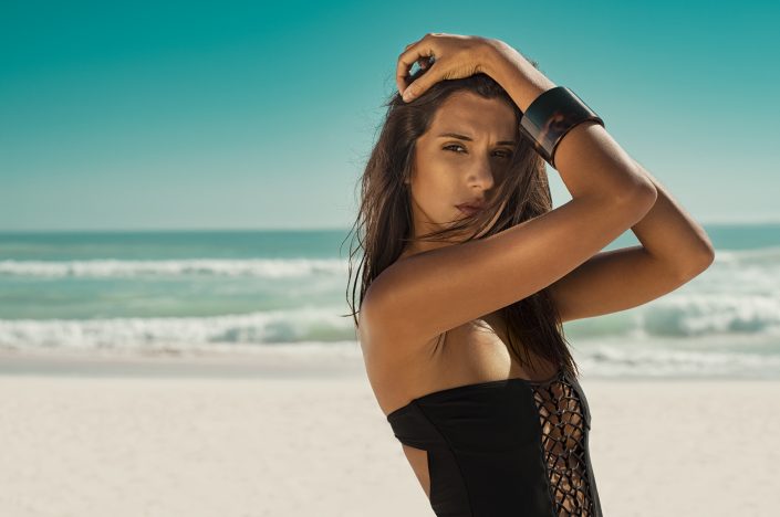 Fashion woman in black swimsuit